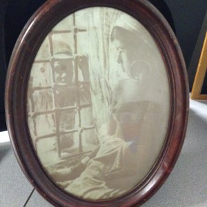 This WWII era picture is very disturbing.  We're looking for any information militaria buffs might have (not an appraisal - the history behind the picture).