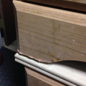 Bedroom Set - Bedstand - close up of leg damage