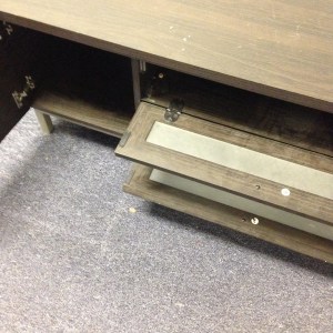 Entertainment Center #1. Close up of the 3 center drawers with the doors open, as well as the two side cabinets with the doors open.